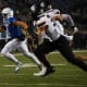 SDSU's quarterback Mark Gronowski (11) runs with the ball on Friday, Dec. 15, 2023 at Dana J. Dykhouse in Brookings.